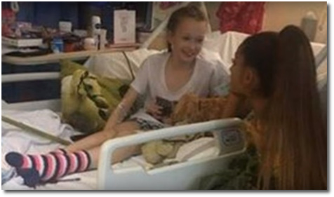 Ariana chatting with Jaden Farrell Mann at the Manchester Children's hospital June 3, 2017